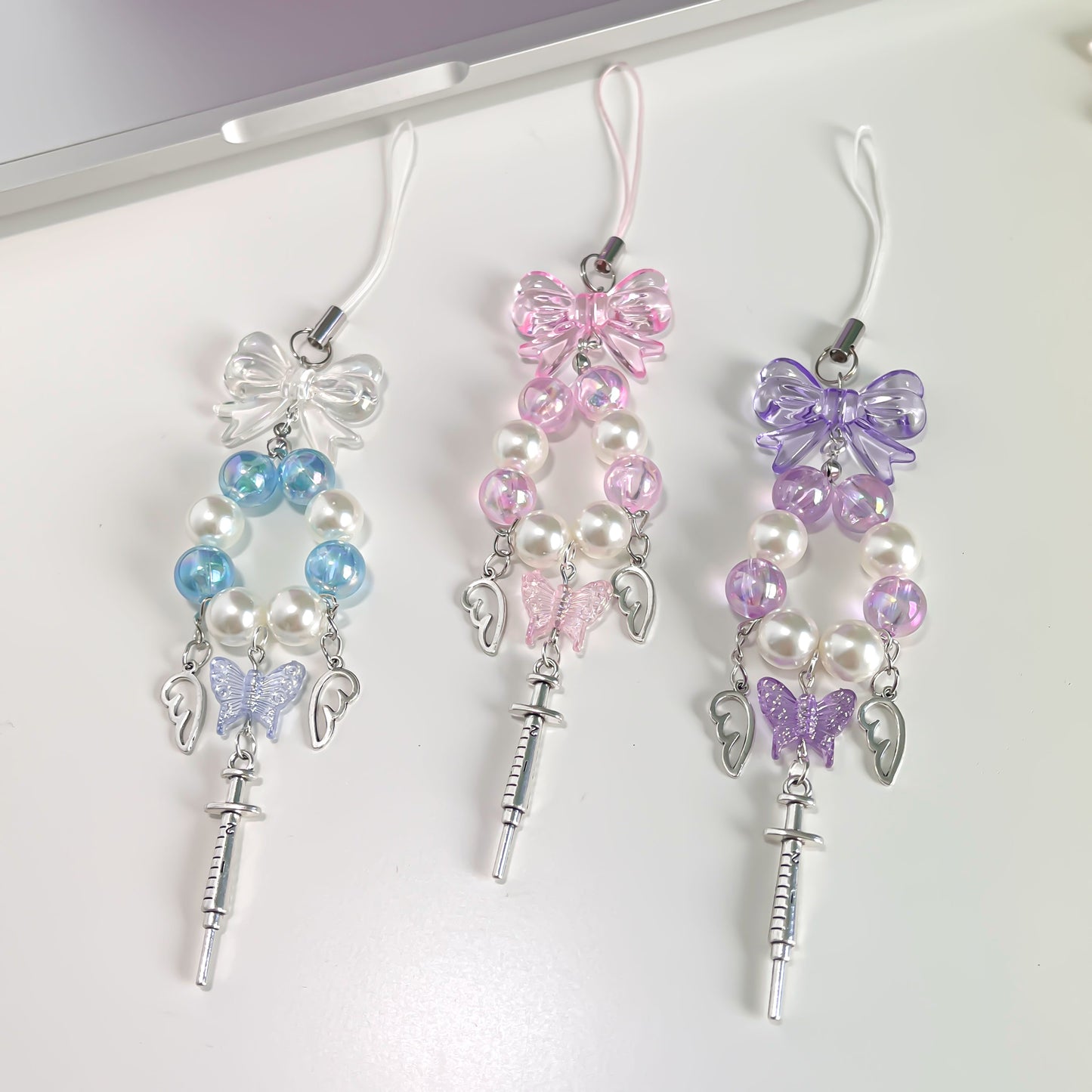 Wings phone charm