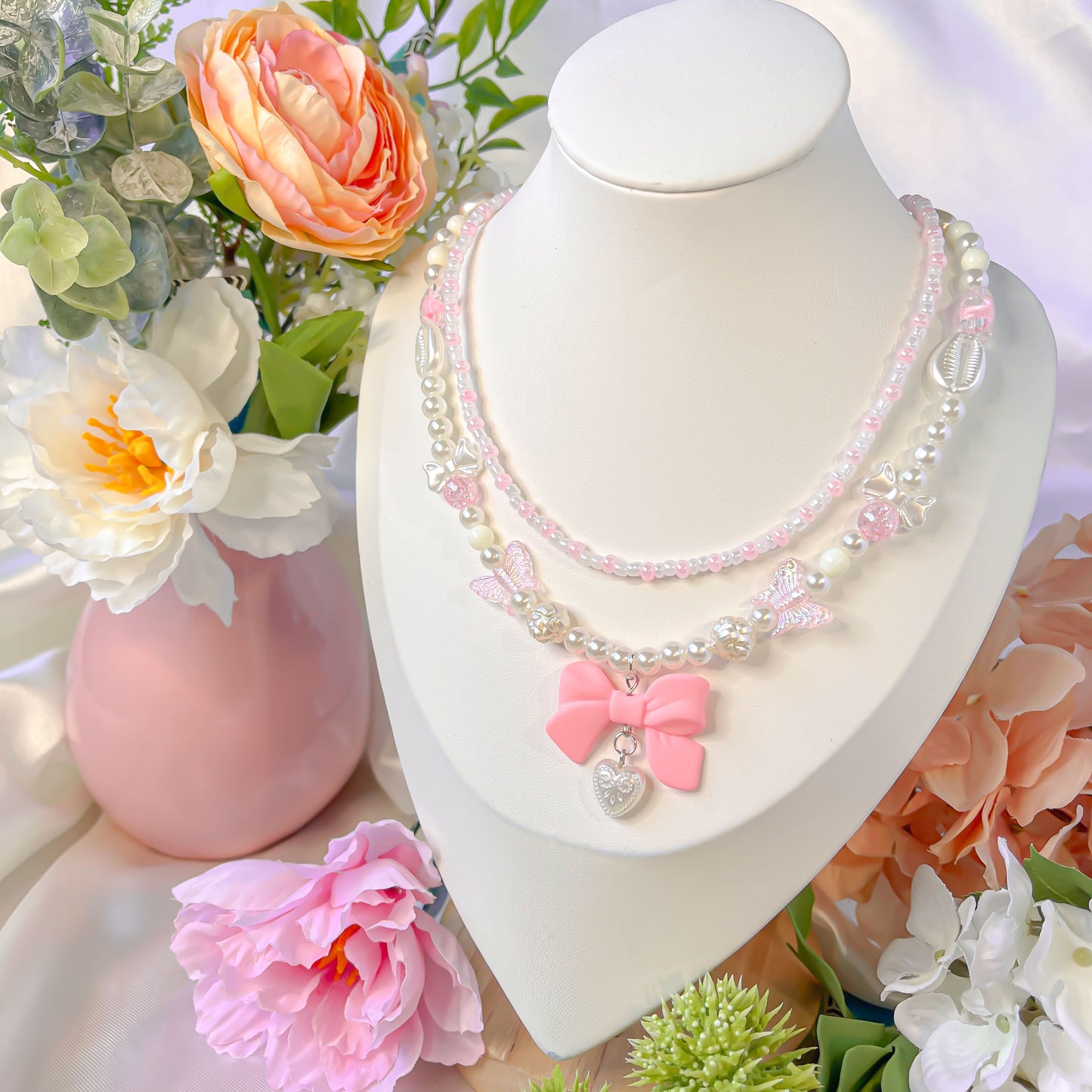 Double chain bow tie necklace