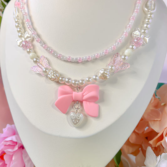 Double chain bow tie necklace