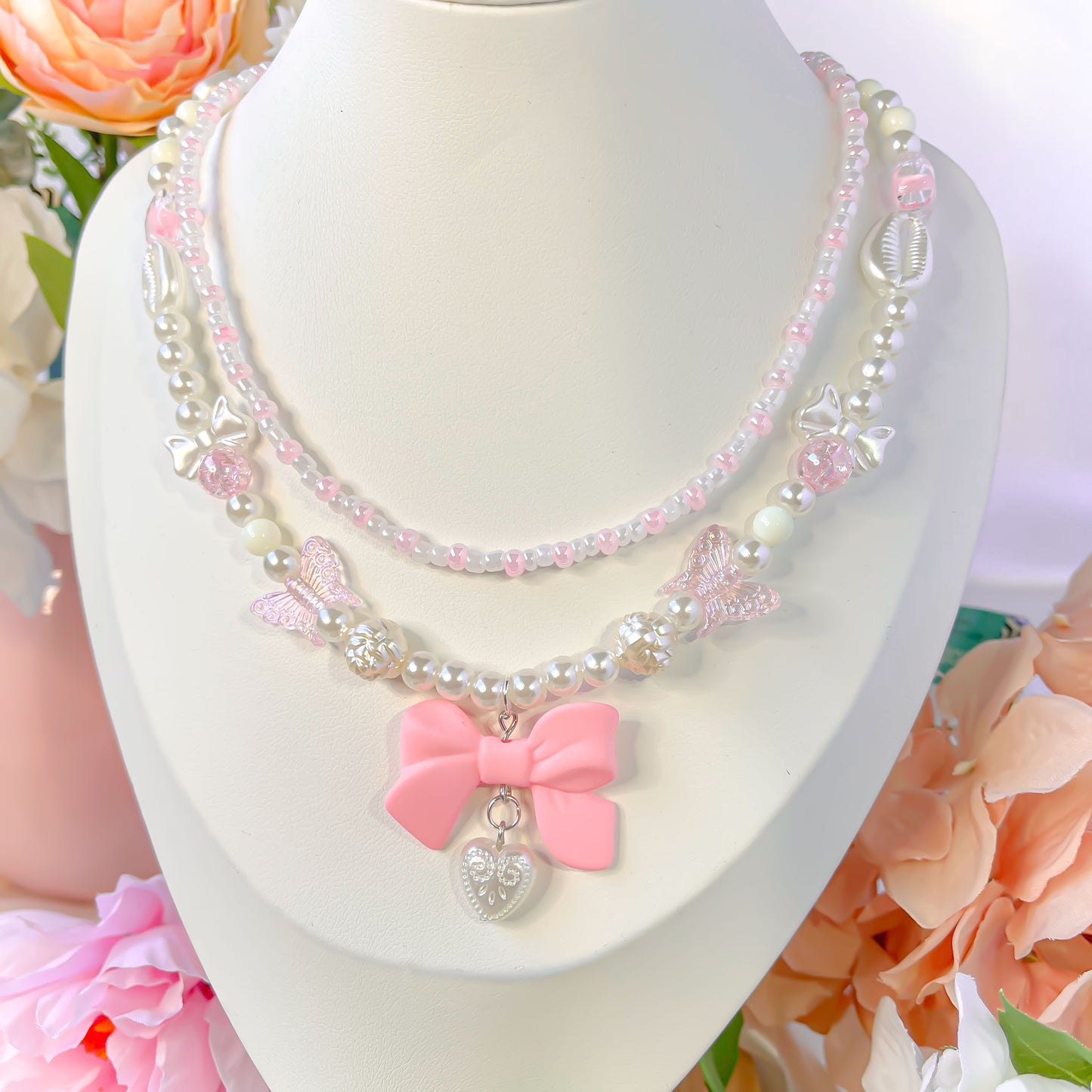 Double chain bow tie necklace