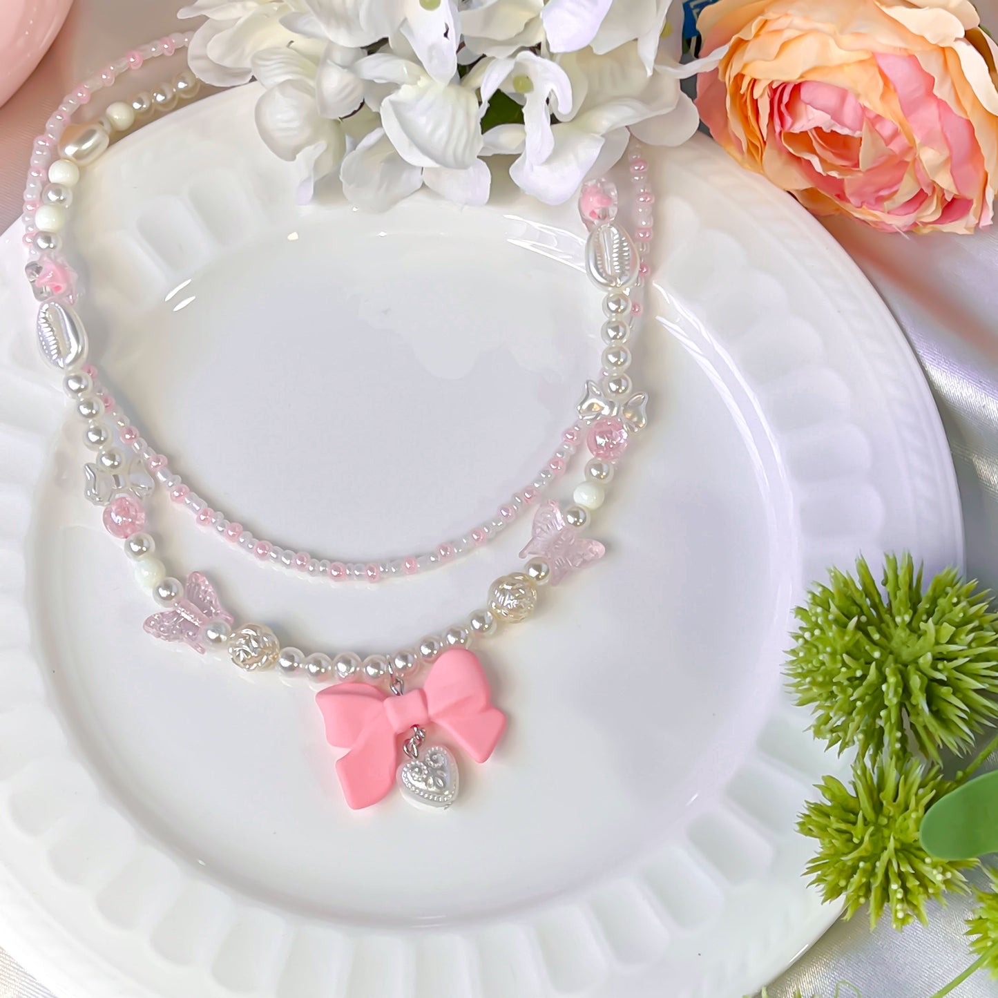 Double chain bow tie necklace