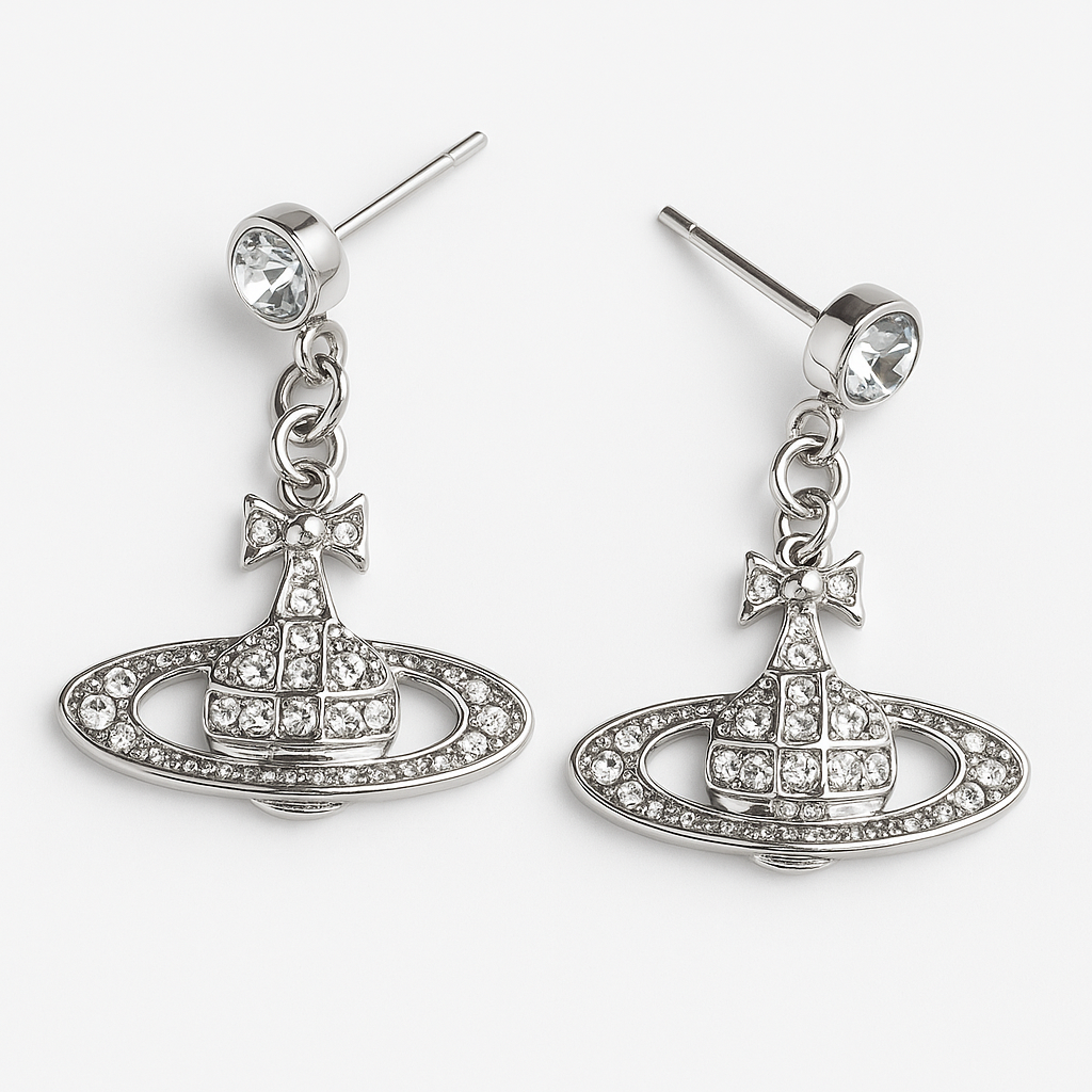 Cosmic orbit silver rhinestone earrings with bow and planet design – inspired by Y2K & space aesthetic