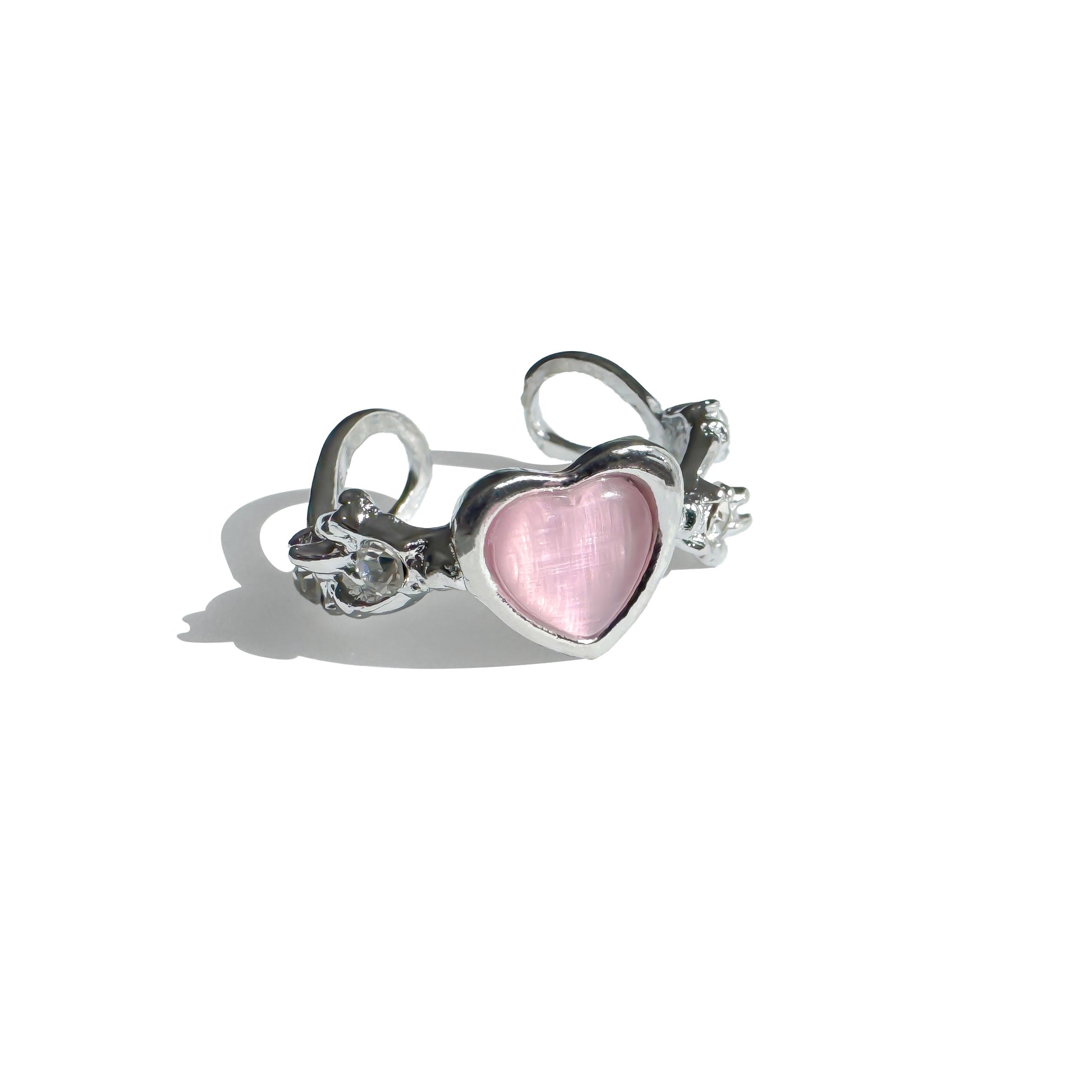 Glossy pink resin heart ring with sculptural silver band 