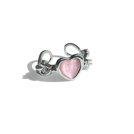 Glossy pink resin heart ring with sculptural silver band 